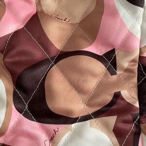 Coach reversible quilted vest. Brown, tan with pink and silver buttons. Size S